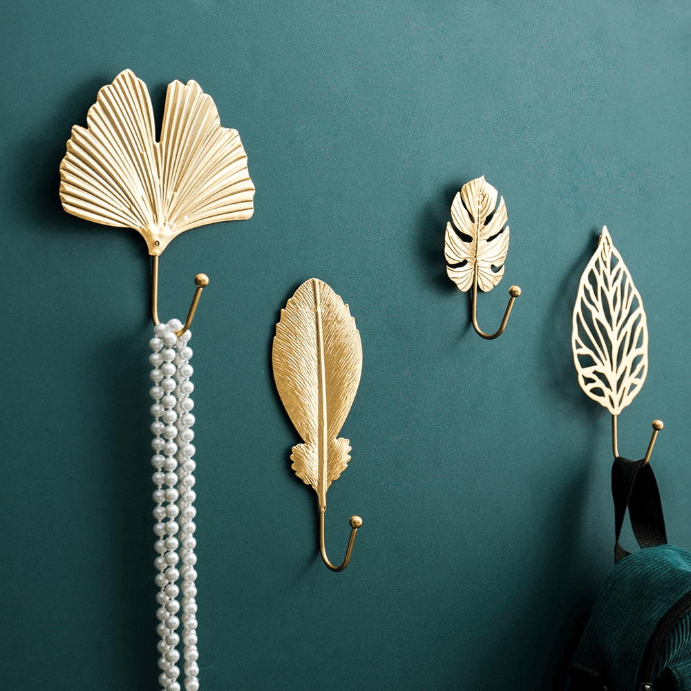 Ganchos de pared de metal con motivos de hojas de la naturaleza