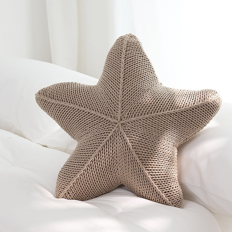 Almohada tejida a mano con forma de estrella de mar