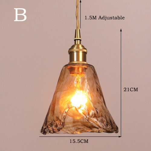 Pendelleuchte aus bernsteinfarbenem Glas in Messing