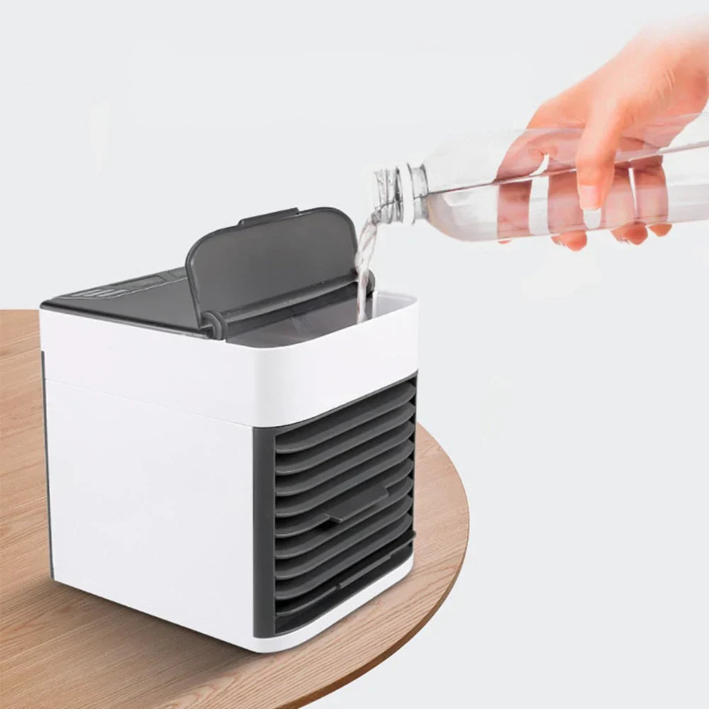 Mini climatiseur portable – Refroidissez, humidifiez et purifiez l'air à la maison ou au bureau.