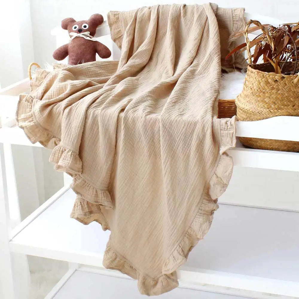 Ruffled Muslin babyteppe i økologisk bomull – hvit, beige, rosa, lilla og blå