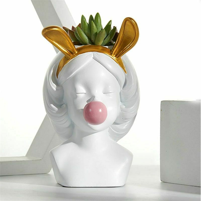 Vase en céramique représentant un joli visage de fille en chewing-gum