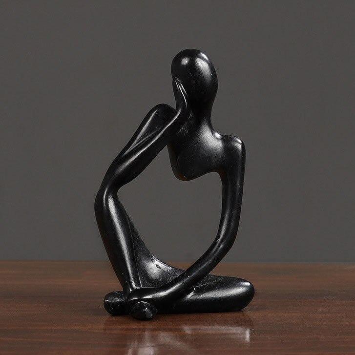 Sculpture en figurine de penseur abstrait