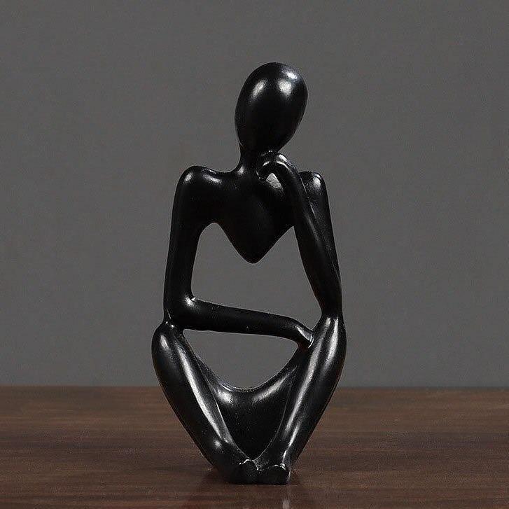 Sculpture en figurine de penseur abstrait