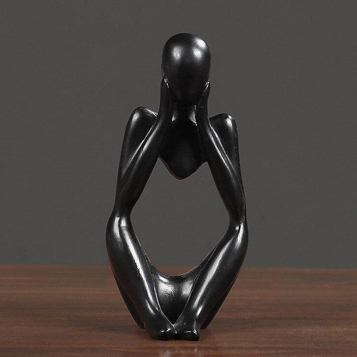 Sculpture en figurine de penseur abstrait