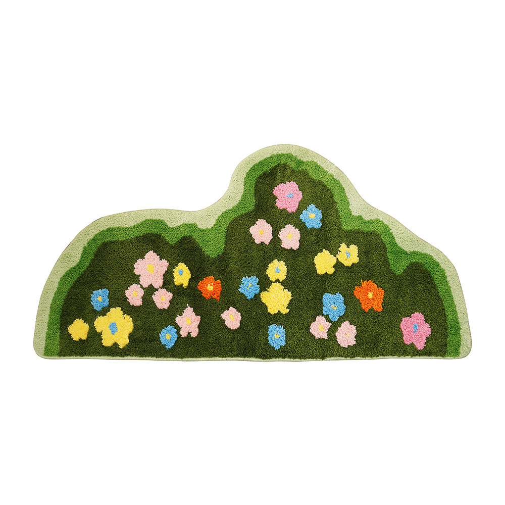 Tapis décoratif en gazon fleuri vert