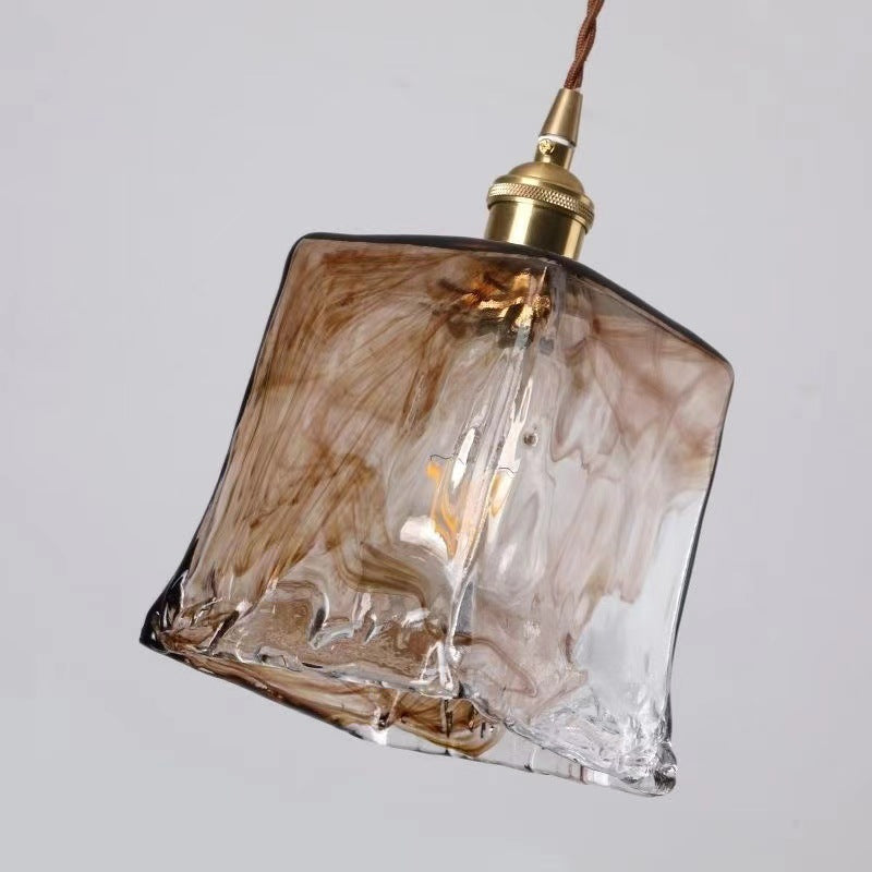 Lampe à suspension en laiton et verre ambré