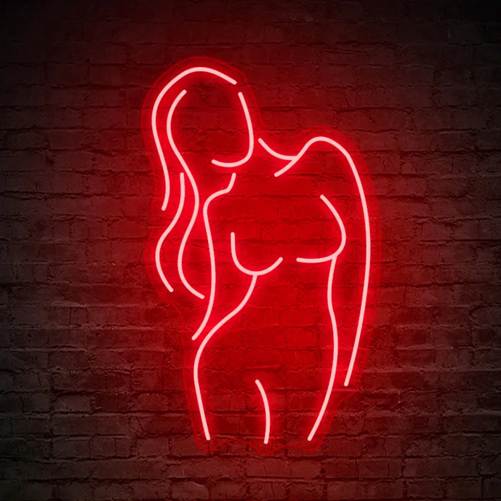 Segnali al neon con silhouette femminile