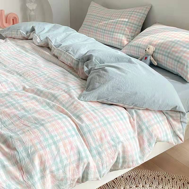 Colección de ropa de cama con estampado de cuadros suaves