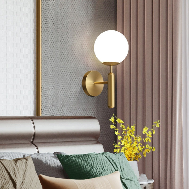 Upright Milky Glass Ball LED Wall Light with Brushed Brass Lamp Fixture in Mid-Century Modern Style