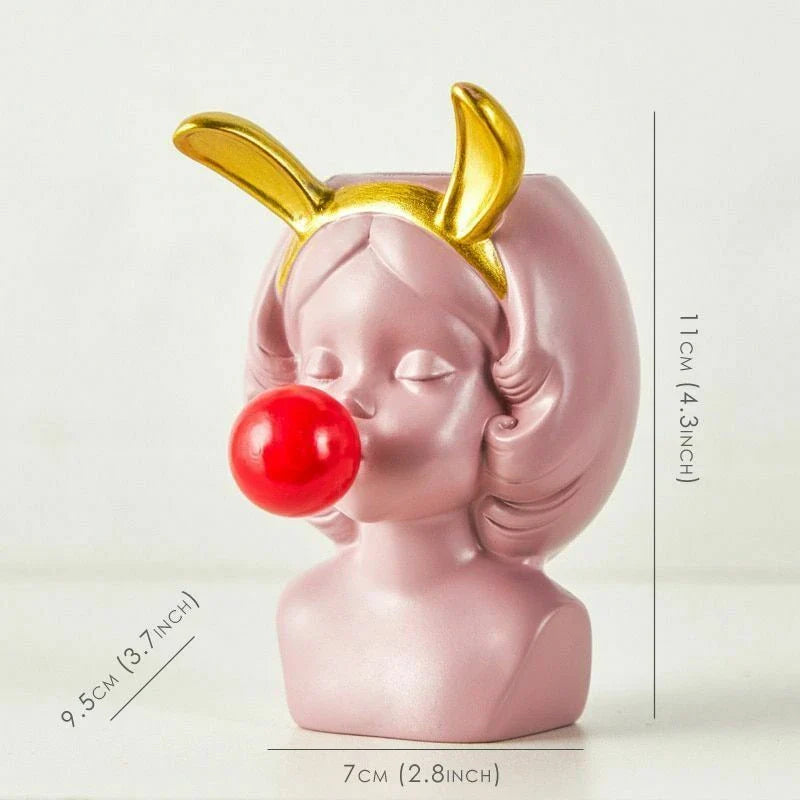 Vase en céramique représentant un joli visage de fille en chewing-gum