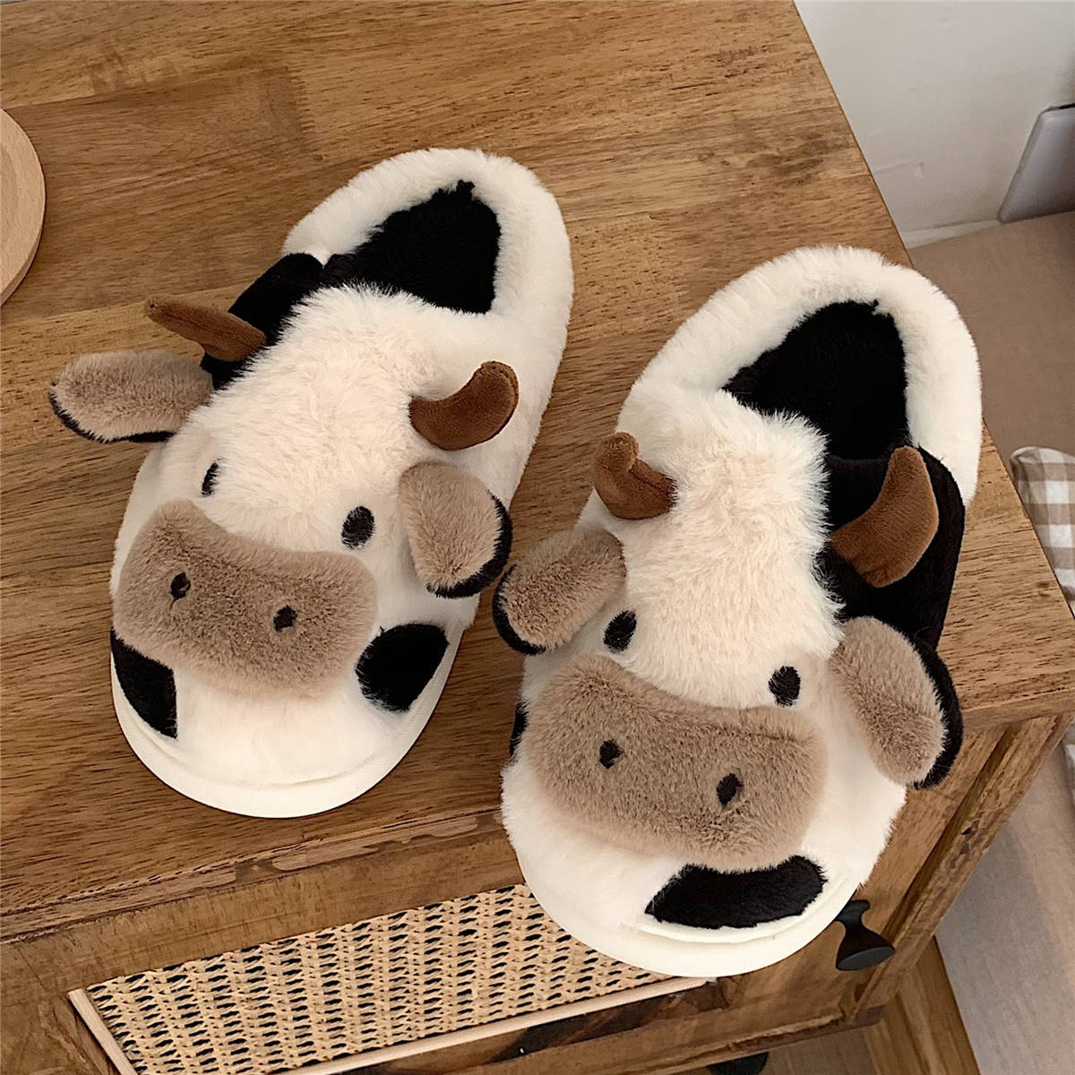 Pantuflas de vaca mullidas