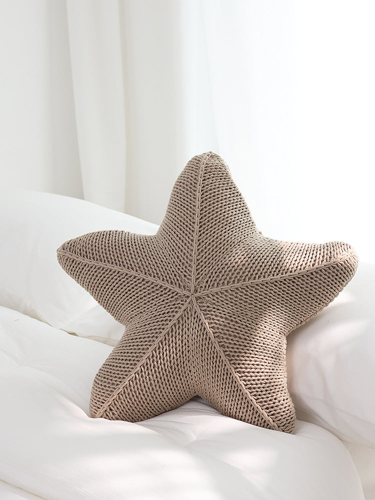 Almohada tejida a mano con forma de estrella de mar