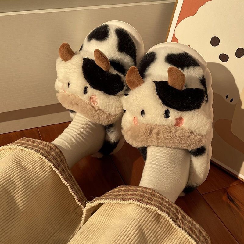 Pantuflas de vaca mullidas