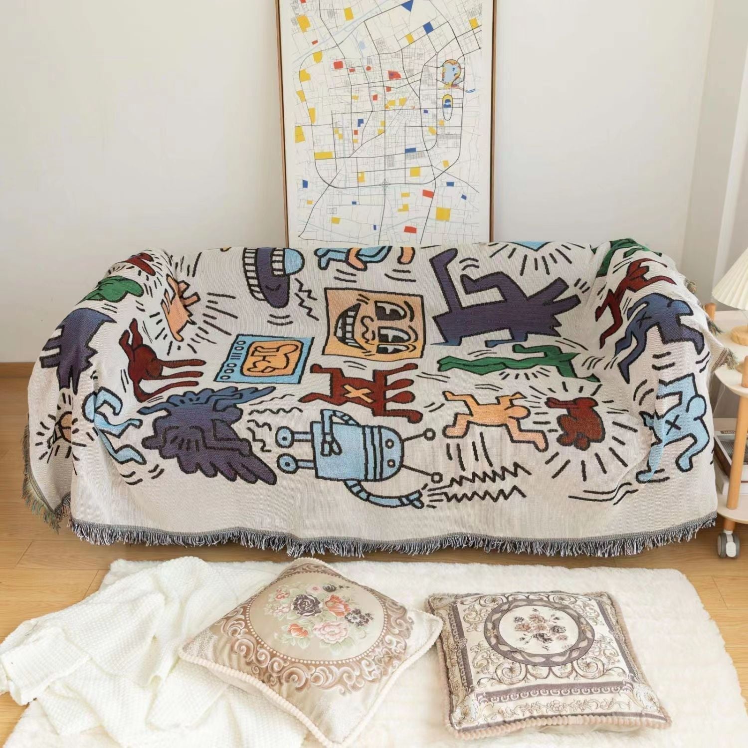 Coperta a forma di puzzle di Keith Haring