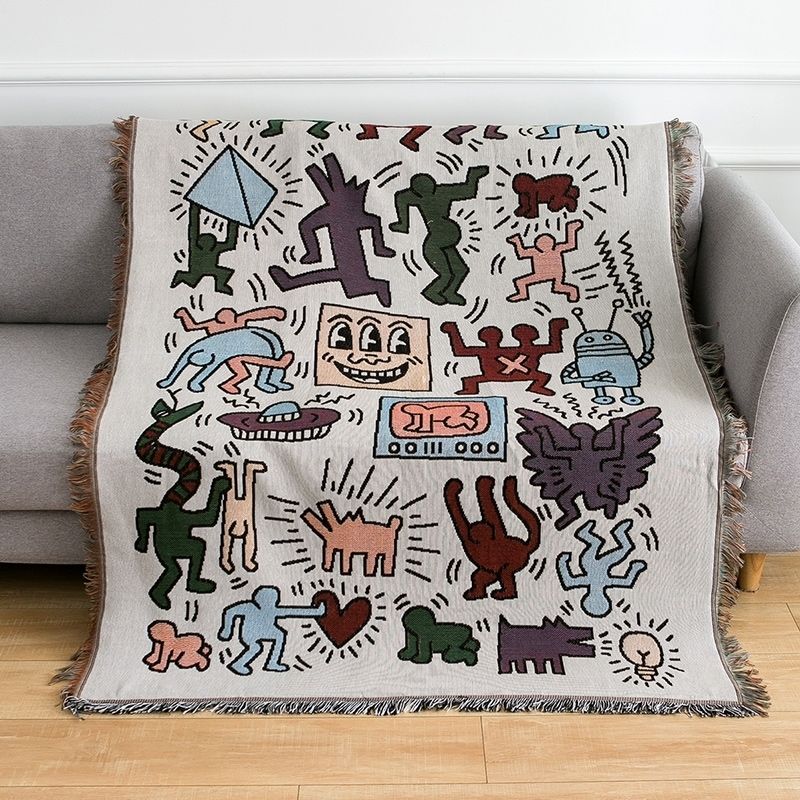 Keith Haring stikksag-kastteppe