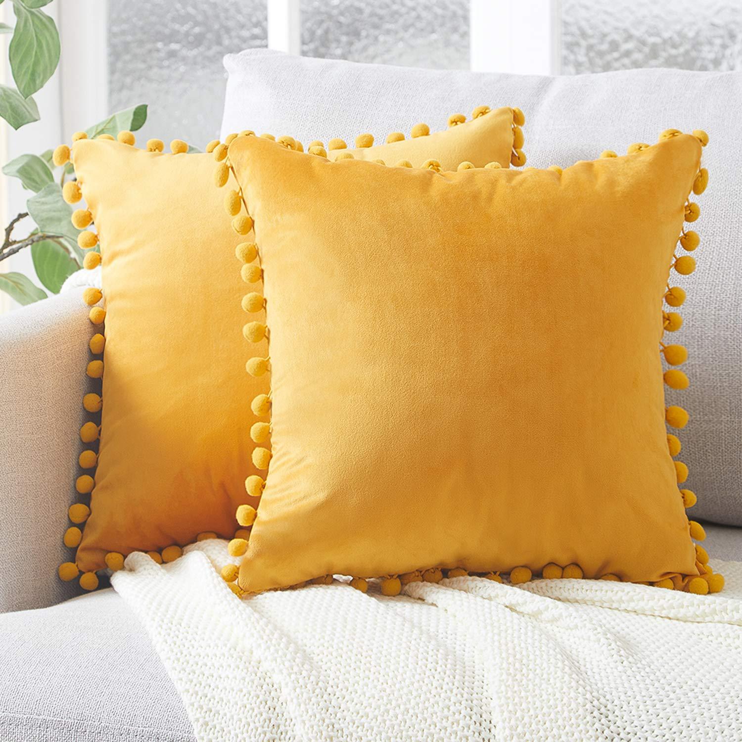 Housses de coussin à pompons