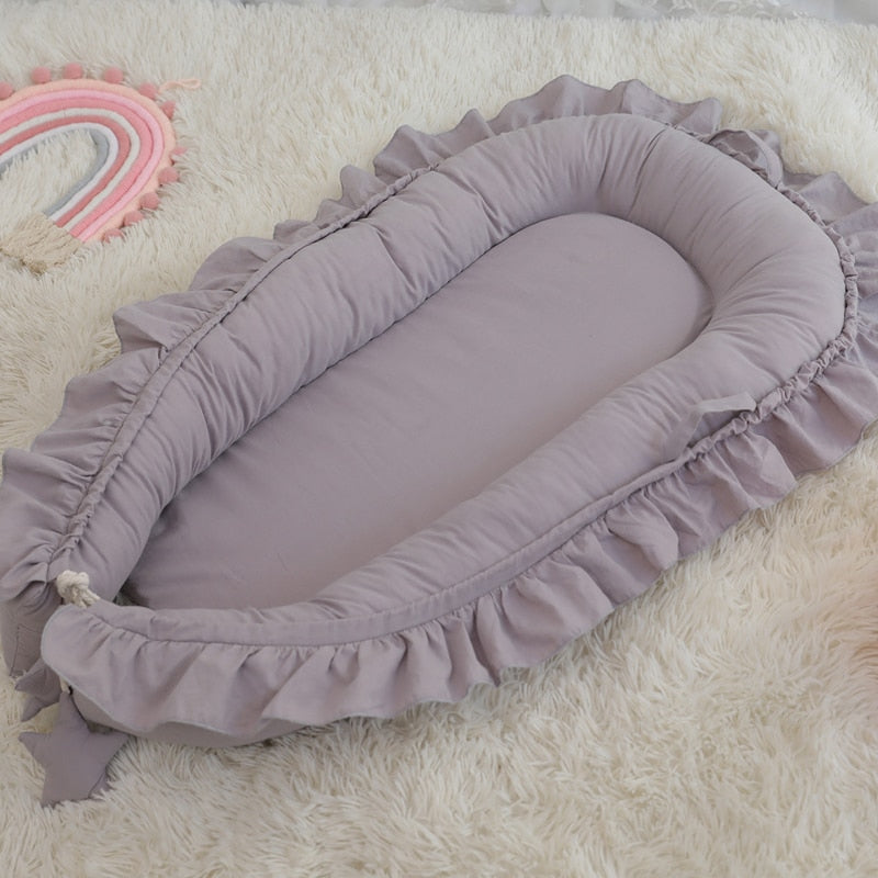 Elegantes gepolstertes Babynest