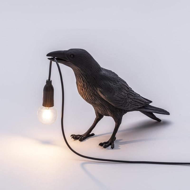 La lampe à oiseaux corbeaux