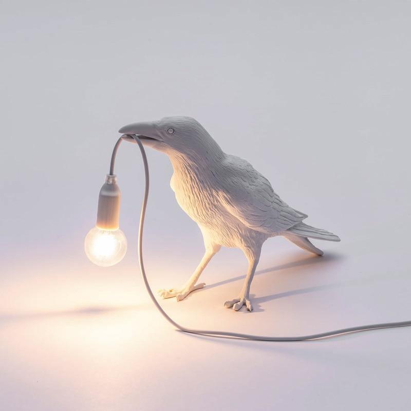 La lampe à oiseaux corbeaux