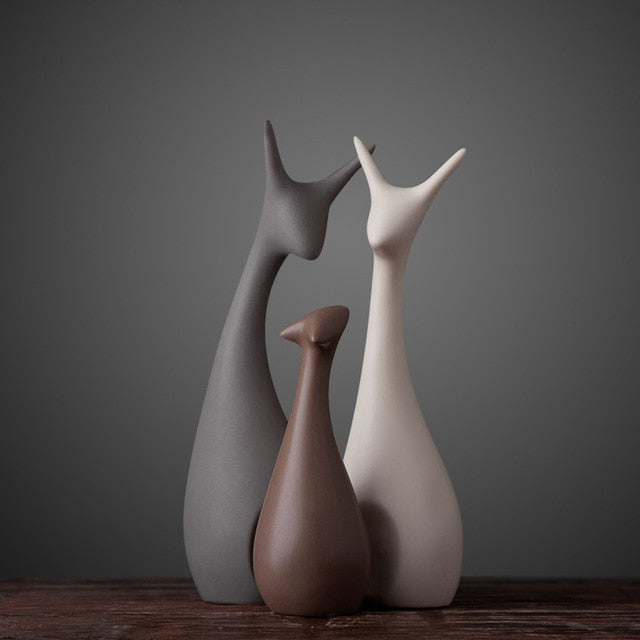 Figurines minimalistes de famille de cerfs