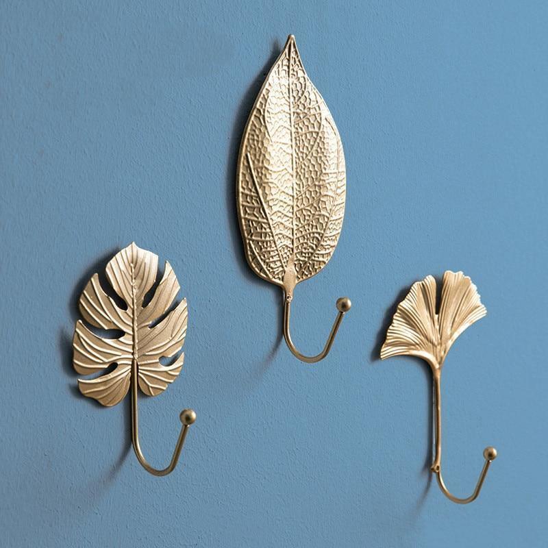 Ganchos de pared de metal con motivos de hojas de la naturaleza