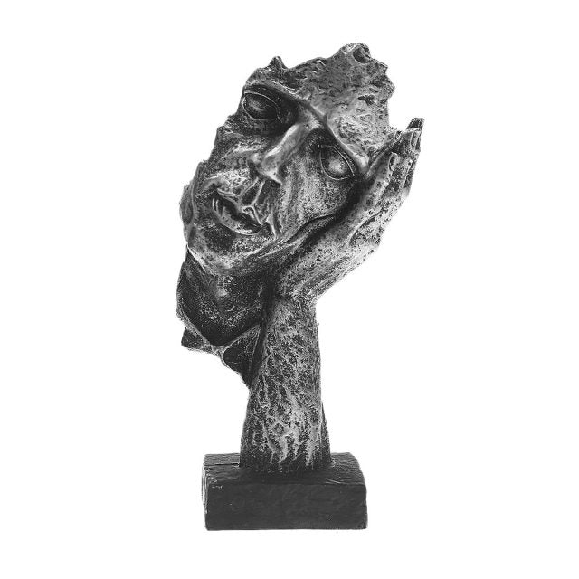 Sculpture des visages d'Odin