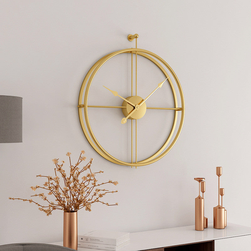 Reloj de pared metálico minimalista grande dorado