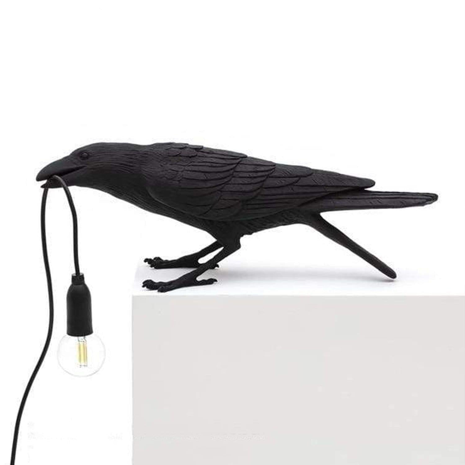 La lampe à oiseaux corbeaux