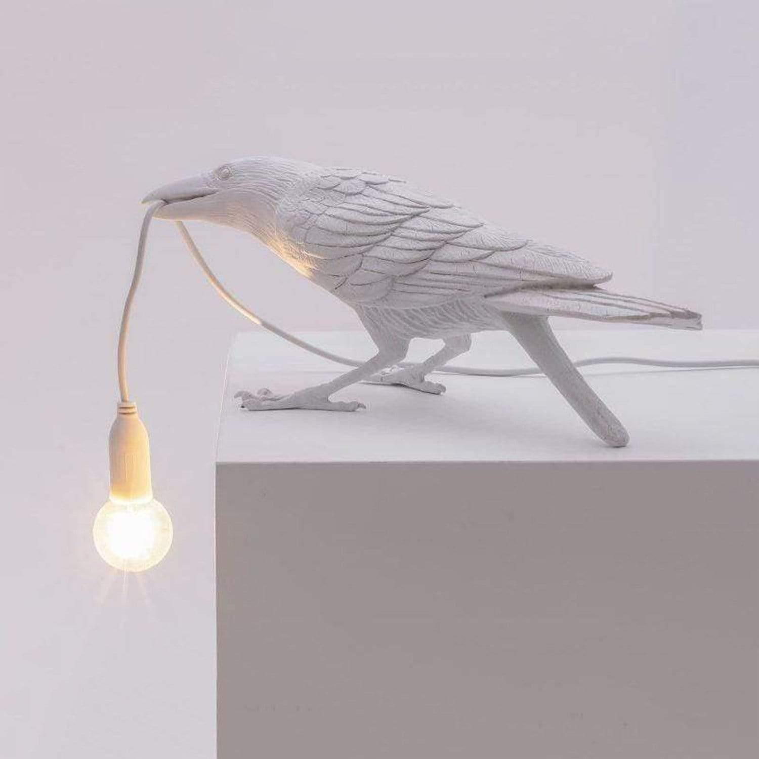 La lampe à oiseaux corbeaux