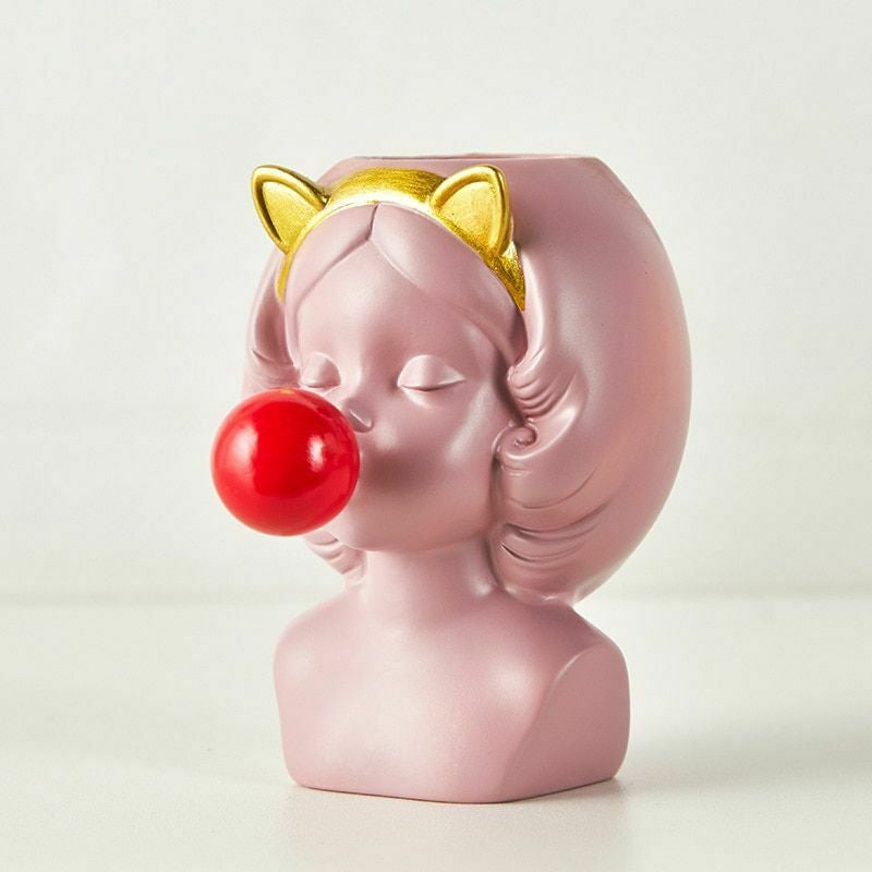 Vase en céramique représentant un joli visage de fille en chewing-gum